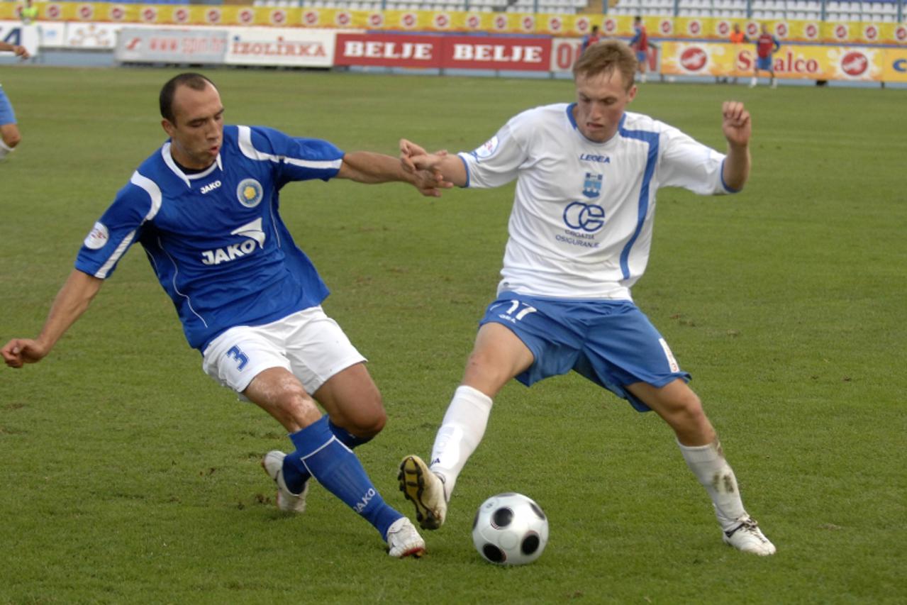 'sport-19.09.2009.osijek,hrvatska,prvenstvena nogometna utakmica izmedju nk osijeka i nk zadra,vedran jugovic bijeli i erdzan beciri Photo: Davor Javorovic/VLM'