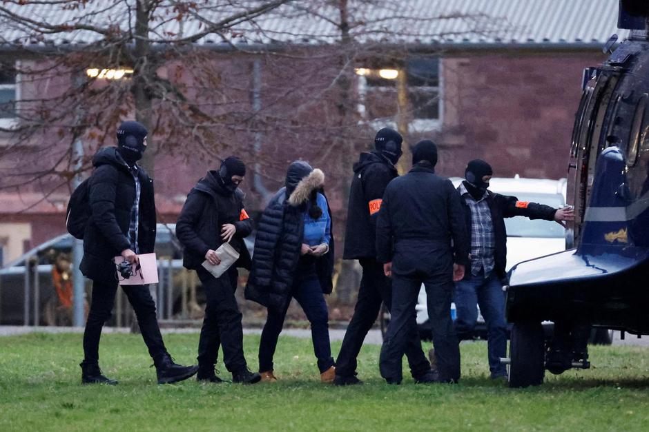 Police escorts a person in Karlsruhe