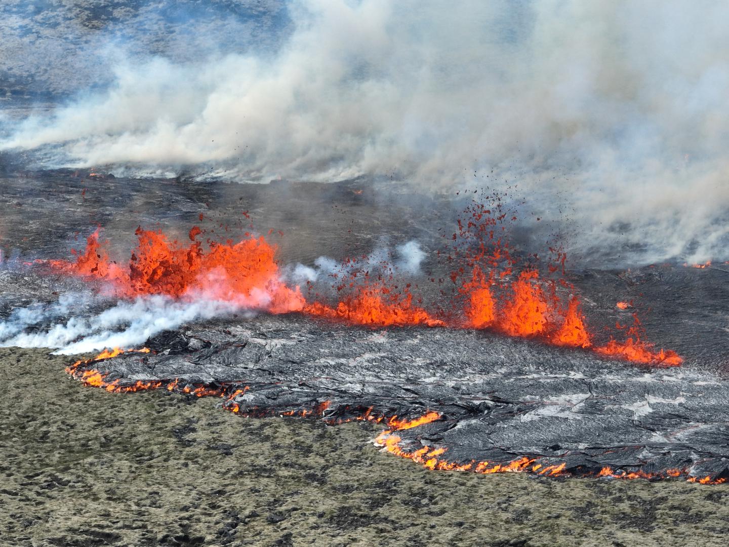 Smoke billows and lava spurts after the eruption of a volcano, on the Reykjanes peninsula, near the capital Reykjavik, in southwest Iceland, July 10, 2023, in this picture obtained from social media. Juergen Merz - Glacier Photo Artist/via REUTERS  THIS IMAGE HAS BEEN SUPPLIED BY A THIRD PARTY. MANDATORY CREDIT. NO RESALES. NO ARCHIVES. Photo: JUERGEN MERZ - GLACIER PHOTO ART/REUTERS