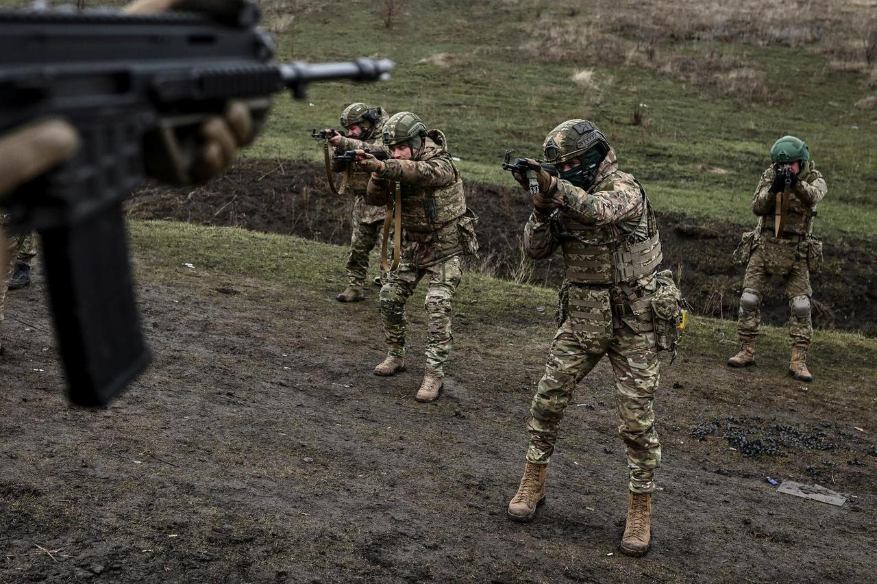 Ukrainian servicemen attend a training near the town of Pokrovsk