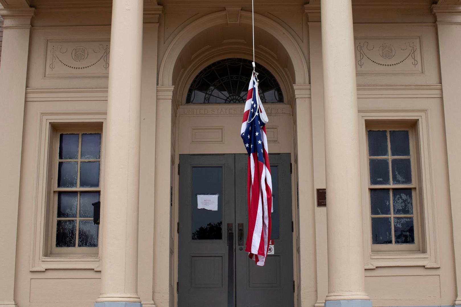 A tattered and tangled American Flag hangs from a rope outside the Matagorda County Museum after Hurricane Beryl moved through the area in Bay City, Texas, U.S. July 8, 2024.  REUTERS/Kaylee Greenlee Beal Photo: KAYLEE GREENLEE BEAL/REUTERS