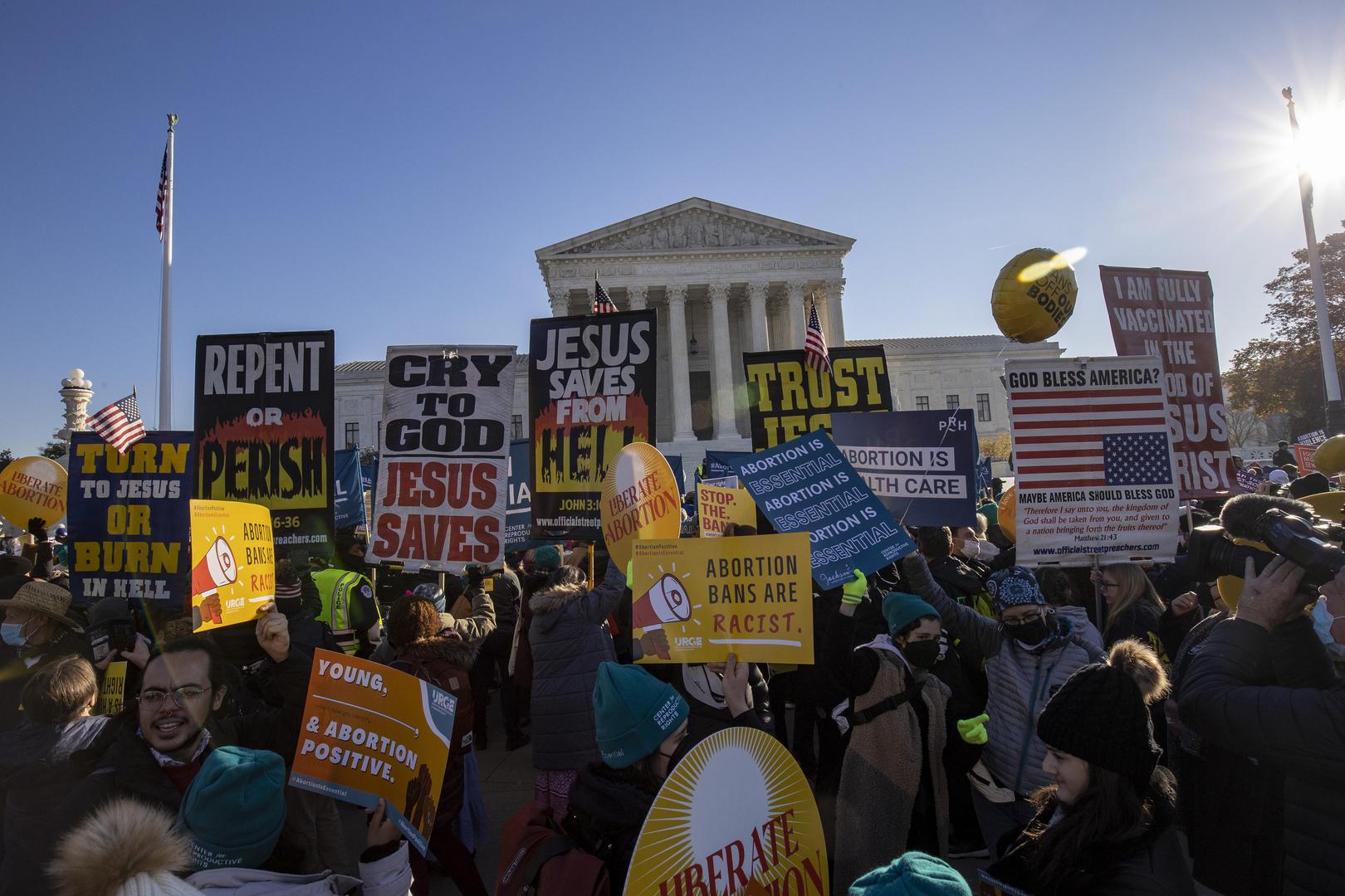 Protesters gather at the Supreme Court in Washington, D.C. on Wednesday, December 1, 2021. The court heard today the case Dobbs v. Jackson Women's Health Organization on the Mississippi law that bans nearly all abortions after 15 weeks. It is expected to be a direct challenge to the 1973 decision to  Roe v. Wade landmark case.    Photo by Tasos Katopodis/UPI . Photo via Newscom