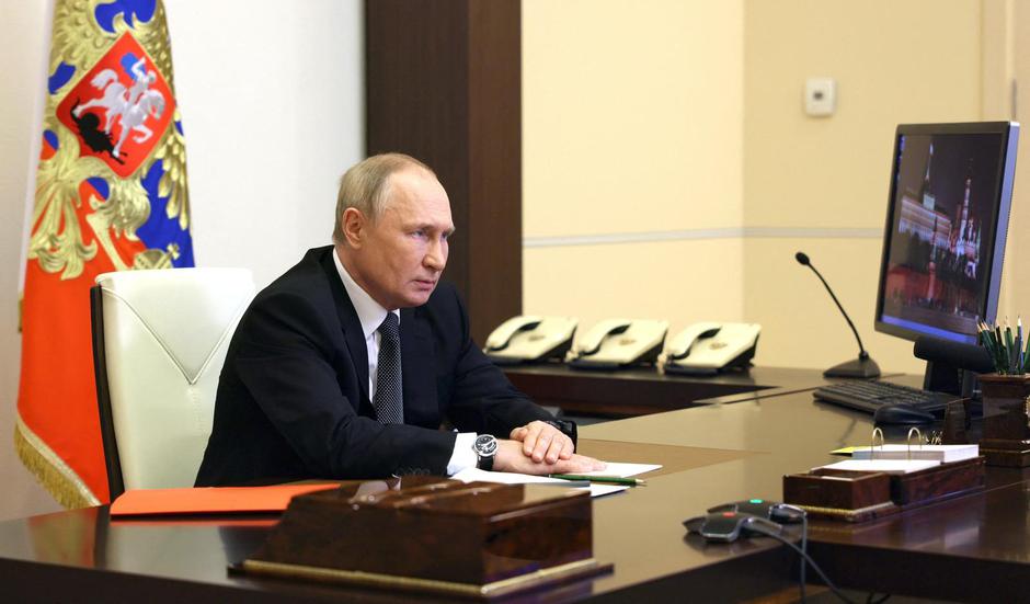 Russian President Putin chairs a Security Council meeting outside Moscow