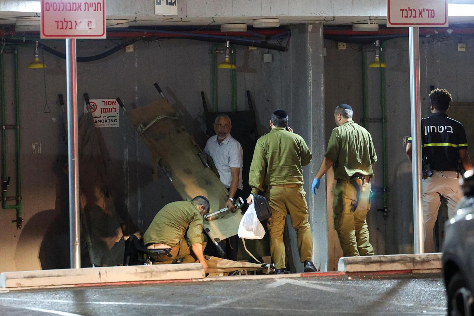 Israeli soldiers and other people fold gurneys following a drone attack from Lebanon, amid cross-border hostilities between Hezbollah and Israel, at Sheba Medical Centre in Ramat Gan, Israel October 13, 2024. Lebanon's Hezbollah claimed responsibility for the attack. REUTERS/Violeta Santos Moura Photo: VIOLETA SANTOS MOURA/REUTERS