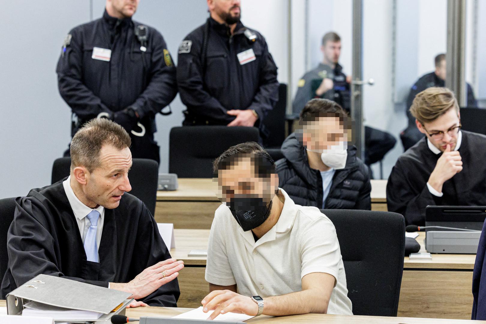 Defendants Mohamed R. and Bashir R. sit next to their lawyers in the courtroom of the Higher Regional Court prior to a hearing in the trial over a November 2019 jewellery heist on the Green Vault (Gruenes Gewoelbe) museum in Dresden's Royal Palace, in Dresden, Germany, March 20, 2023. Jens Schlueter/Pool via REUTERS IMAGE PIXELLATED AT SOURCE. GERMAN COURT REQUESTS THAT THE FACES OF THE DEFENDANTS MUST BE MADE UNRECOGNISABLE Photo: POOL/REUTERS