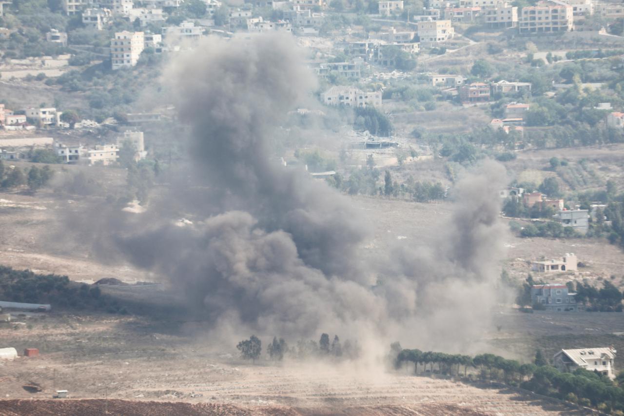 Smoke billows over Khiam, amid ongoing hostilities between Hezbollah and Israeli forces, as seen from Marjayoun