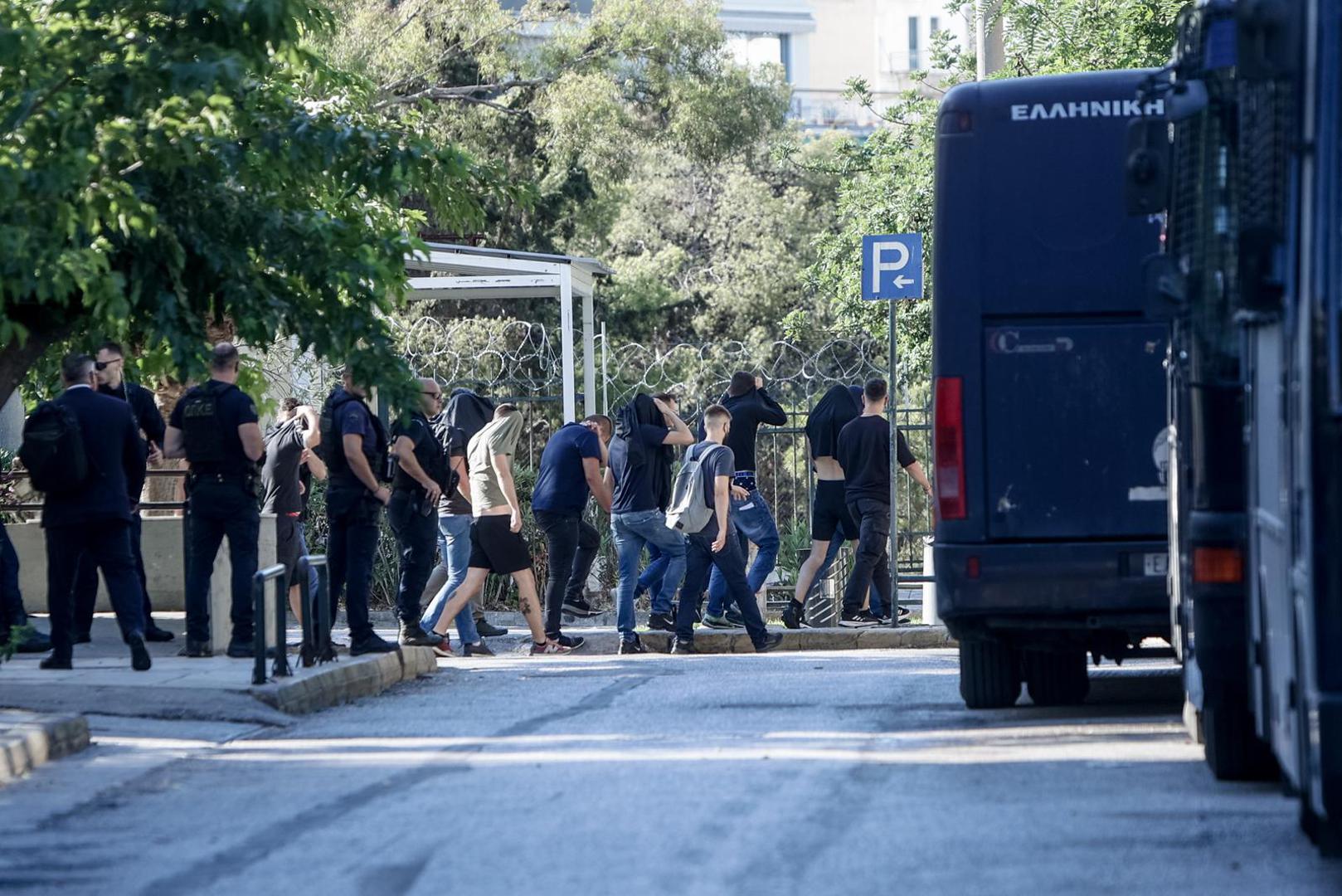 12.08.2023., Atena, Grcka - 40 navijaca izvedeno je jutros pred istraznog suca zbog ispitivanja o sukobu u kojem je smrtno stradao navijac AEK-a. Jucerasnja skupina optuzenika ostaje u pritvoru. Photo: VASILIS REMBAPIS/EUROKINISS/PIXSELL