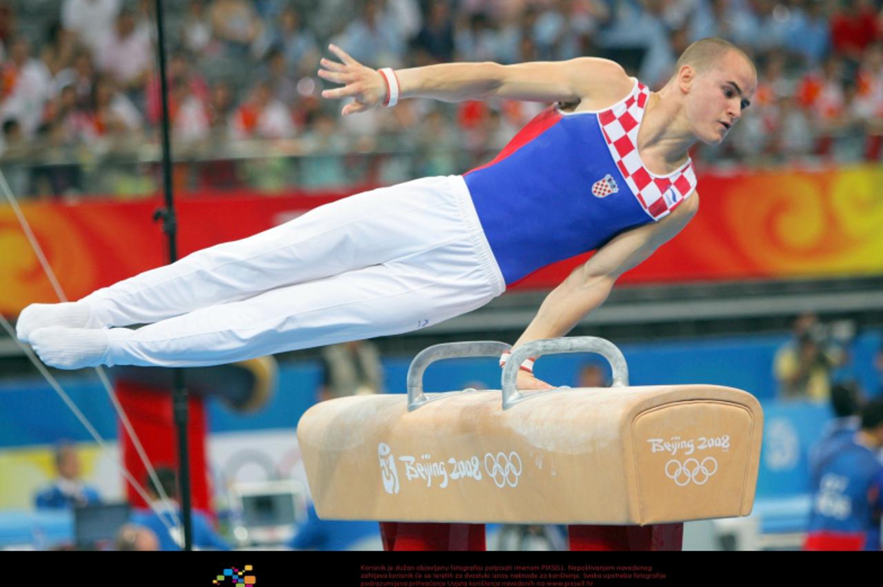 '09.08.2008, Peking, Kina - Olimpijske igre 2008.  Filip Ude osvojio je srebrnu medalju na konju s hvataljkama.   Photo: Zeljko Lukunic/PIXSELL'