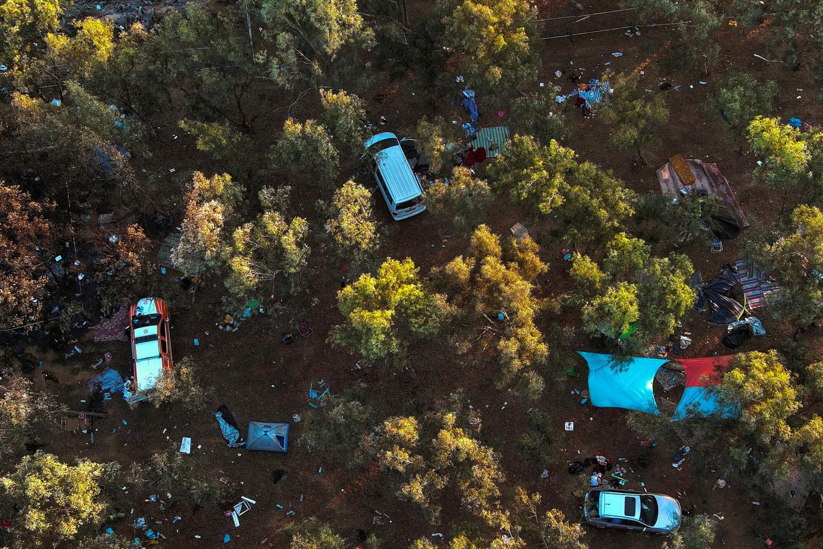 An aerial view shows the personal belongings of festival-goers at the site of an attack on the Nova Festival by Hamas gunmen from Gaza, near Israel's border with the Gaza Strip, in southern Israel, October 12, 2023. REUTERS/Ilan Rosenberg Photo: ILAN ROSENBERG/REUTERS