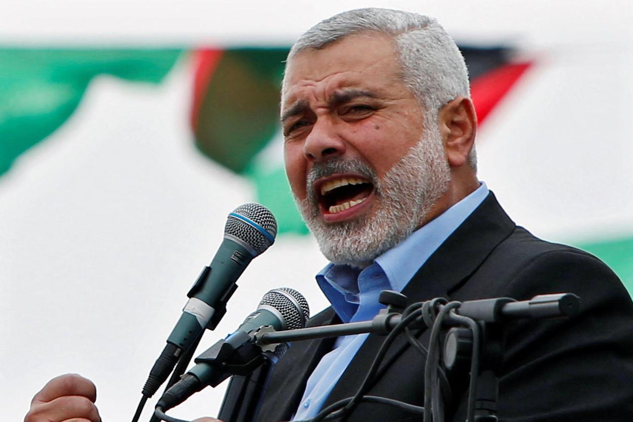 FILE PHOTO: Haniyeh talks to his supporters during a Hamas rally marking the anniversary of the death of its leaders killed by Israel, in Gaza