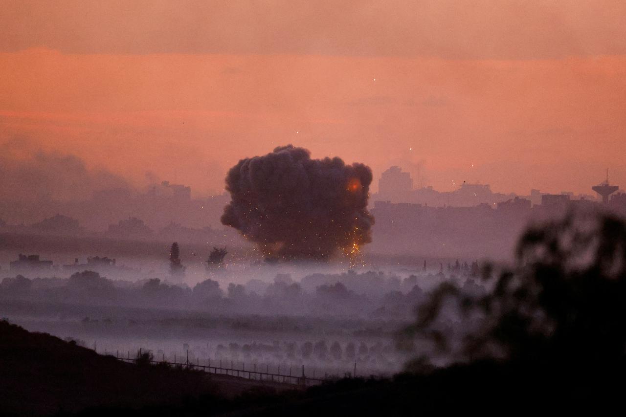 Smoke rises after Israeli air strikes in Gaza, as seen from southern Israel