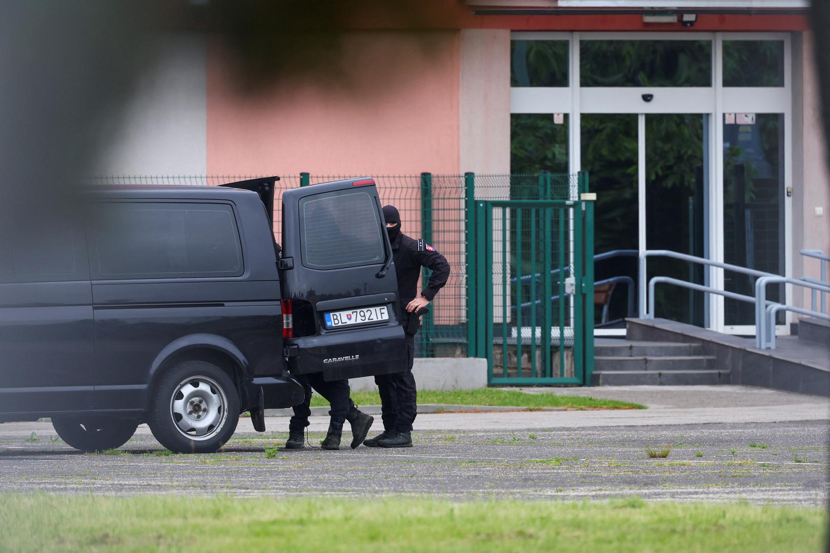 Police stand next to a car on the day Juraj C., suspect in attack on Slovak Prime Minister Robert Fico, is transferred to a Special Court for his hearing, in Pezinok, Slovakia, May 18, 2024. REUTERS/Antonio Bronic Photo: Antonio Bronic/REUTERS