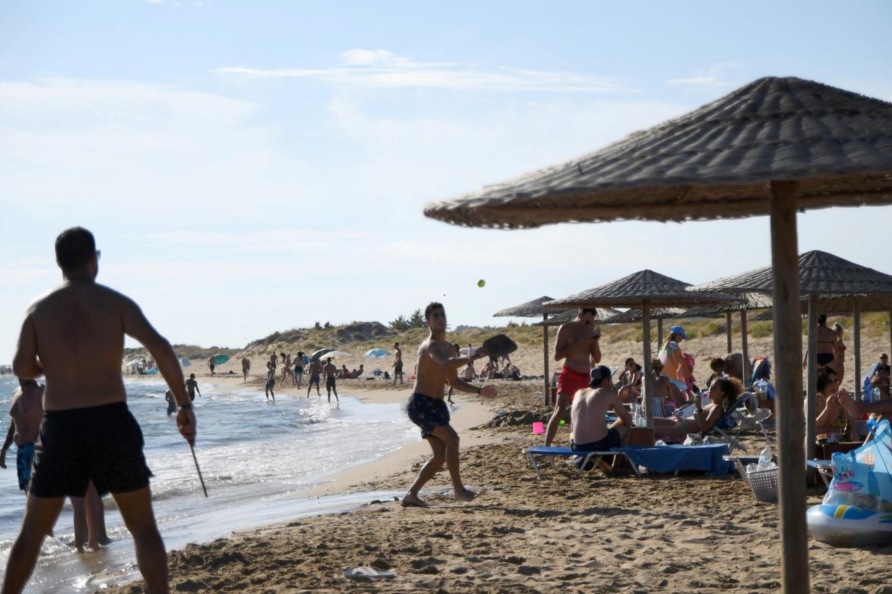 British travelers arrive on the island of Corfu as Britain eased quarantine rules