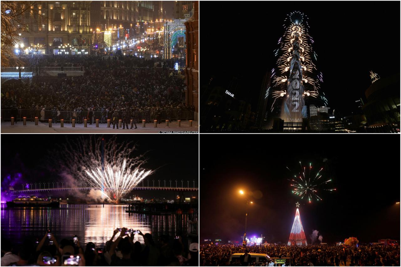 Fireworks explode in the sky over the Kremlin and St. Basil’s cathedral during the New Year's celebrations in Moscow