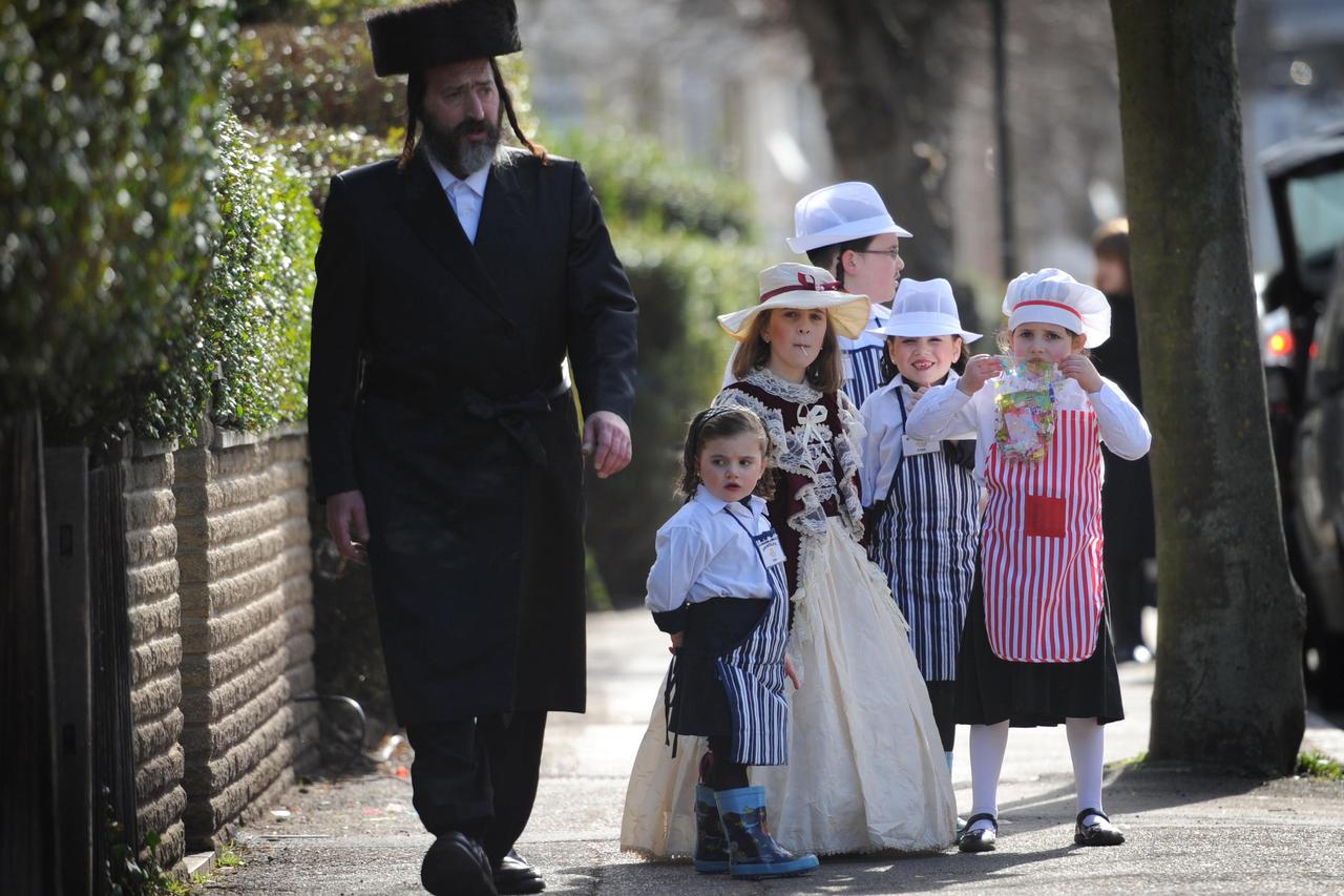 Orthodox Jews in Stamford Hill, north London celebrate Purim, a Jewish holiday that commemorates the deliverance of the Jewish people in the ancient Persian Empire from destruction in the wake of a plot by Haman, a story recorded in the Biblical Book of E