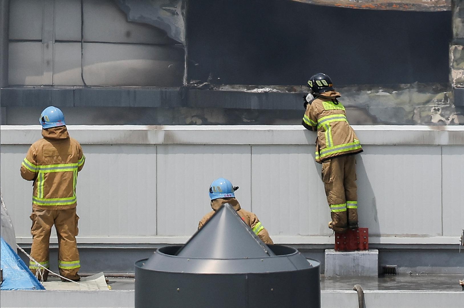 Firefighters work at the site of a deadly fire at a lithium battery factory owned by South Korean battery maker Aricell, in Hwaseong, South Korea, June 24, 2024.   REUTERS/Kim Hong-ji Photo: KIM HONG-JI/REUTERS