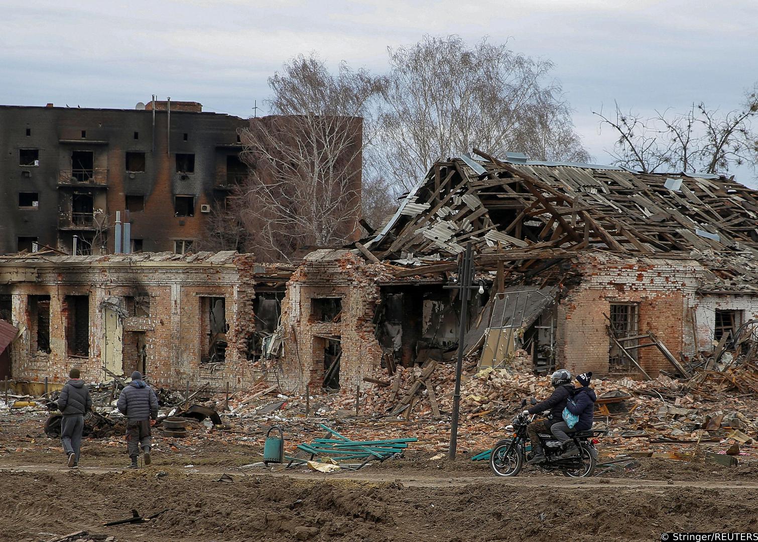 Local walks past buildings damaged by shelling, as Russia’s attack on Ukraine continues, in the town of Trostianets, in Sumy region, March 28, 2022. Picture taken March 28, 2022. REUTERS/Oleg Pereverzev Photo: Stringer/REUTERS