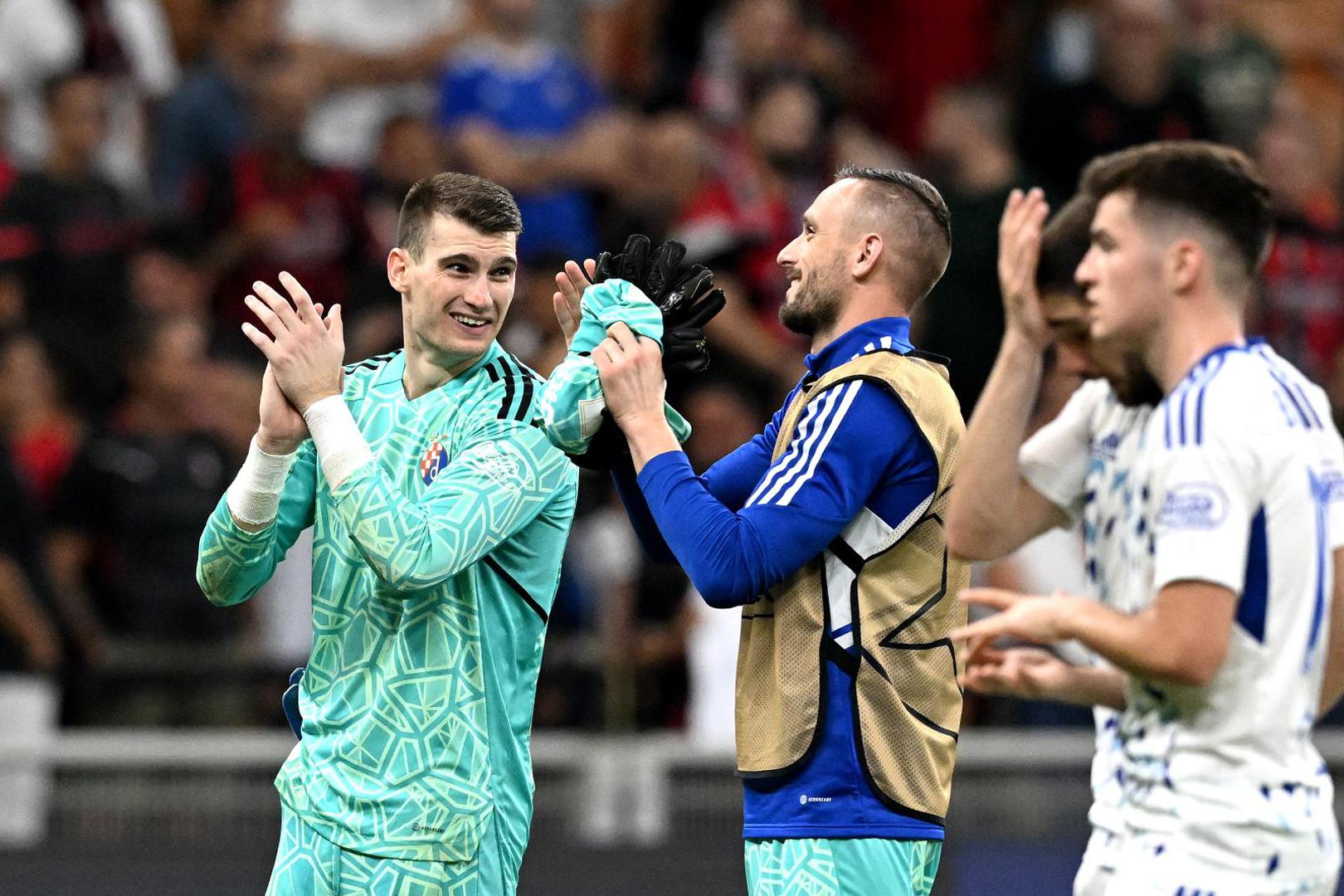 14.09.2022., stadion San Siro, Milano - UEFA Liga prvaka, 2. kolo, skupina E, AC Milan - GNK Dinamo. Dominik Livakovic, Danijel Zagorac.  Photo: Marko Lukunic/PIXSELL