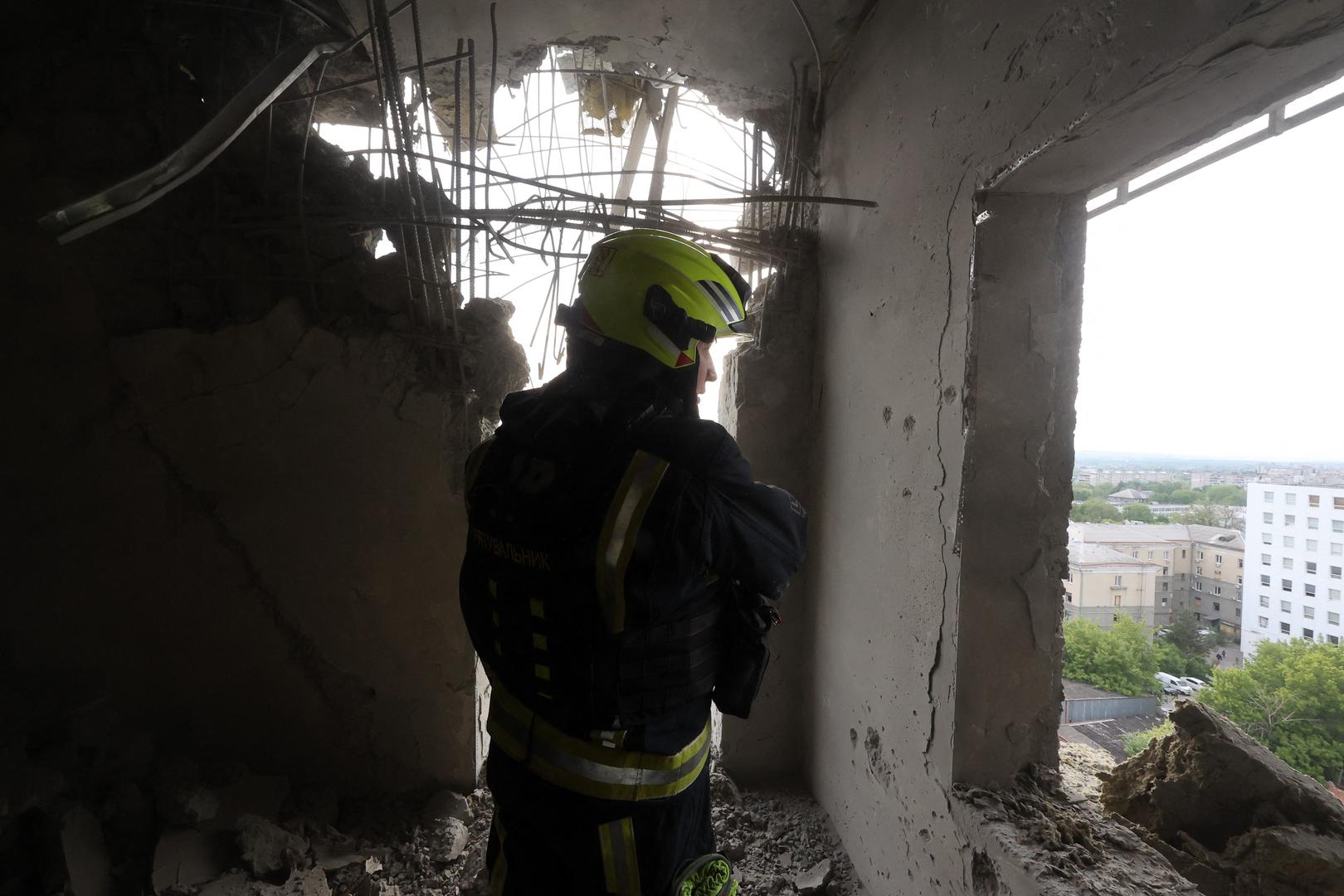 A rescuer is seen in a multi-story residential building damaged by Russian shelling, Kharkiv, northeastern Ukraine, May 14, 2024. A Russian air strike has hit a high-rise residential building in Kharkiv, local officials said, as Russian forces continued to make deeper advances. There was no immediate mention of casualties or the extent of the damage, according to the regional governor, who warned there was a threat of more strikes coming. More than 7,000 people have fled Kharkiv since Russia launched its ground invasion on Friday as Kyiv’s top general warned that while the situation was stabilising, his troops are outgunned and outnumbered. Photo by Viacheslav Madiievskyi/Ukrinform/ABACAPRESS.COM Photo: Madiyevskyy Vyacheslav/Ukrinform/ABACA