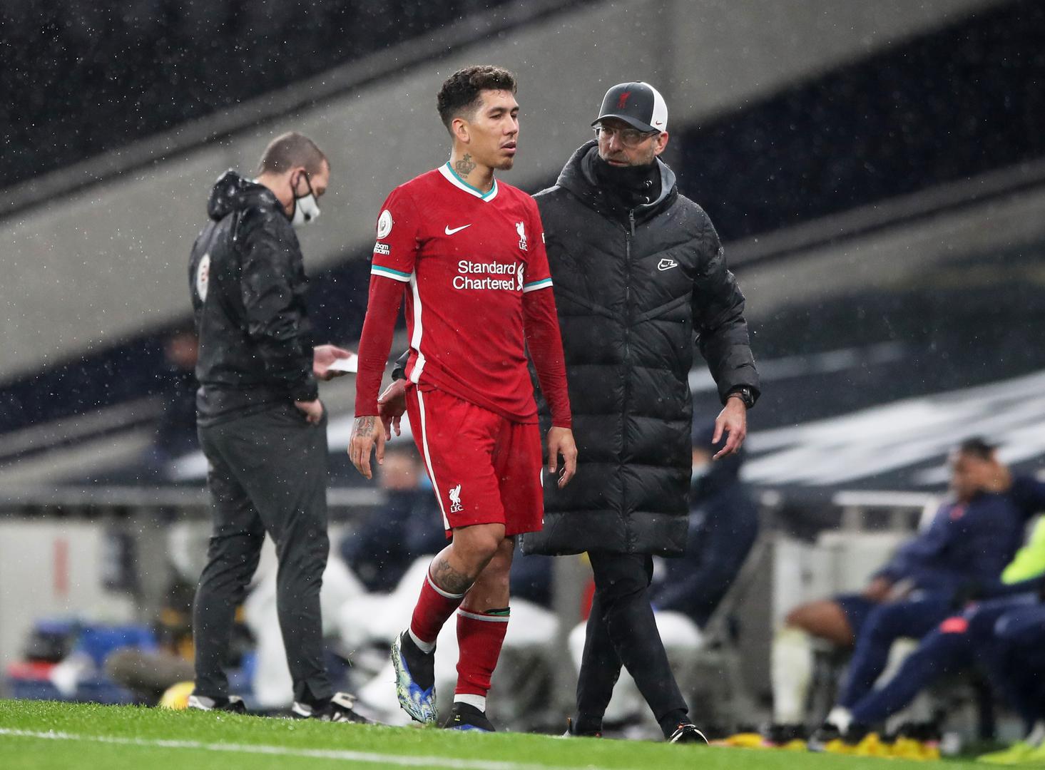 Premier League - Tottenham Hotspur v Liverpool Soccer Football - Premier League - Tottenham Hotspur v Liverpool - Tottenham Hotspur Stadium, London, Britain - January 28, 2021 Liverpool manager Juergen Klopp substitutes off Liverpool's Roberto Firmino Pool via REUTERS/Nick Potts EDITORIAL USE ONLY. No use with unauthorized audio, video, data, fixture lists, club/league logos or 'live' services. Online in-match use limited to 75 images, no video emulation. No use in betting, games or single club /league/player publications.  Please contact your account representative for further details. NICK POTTS