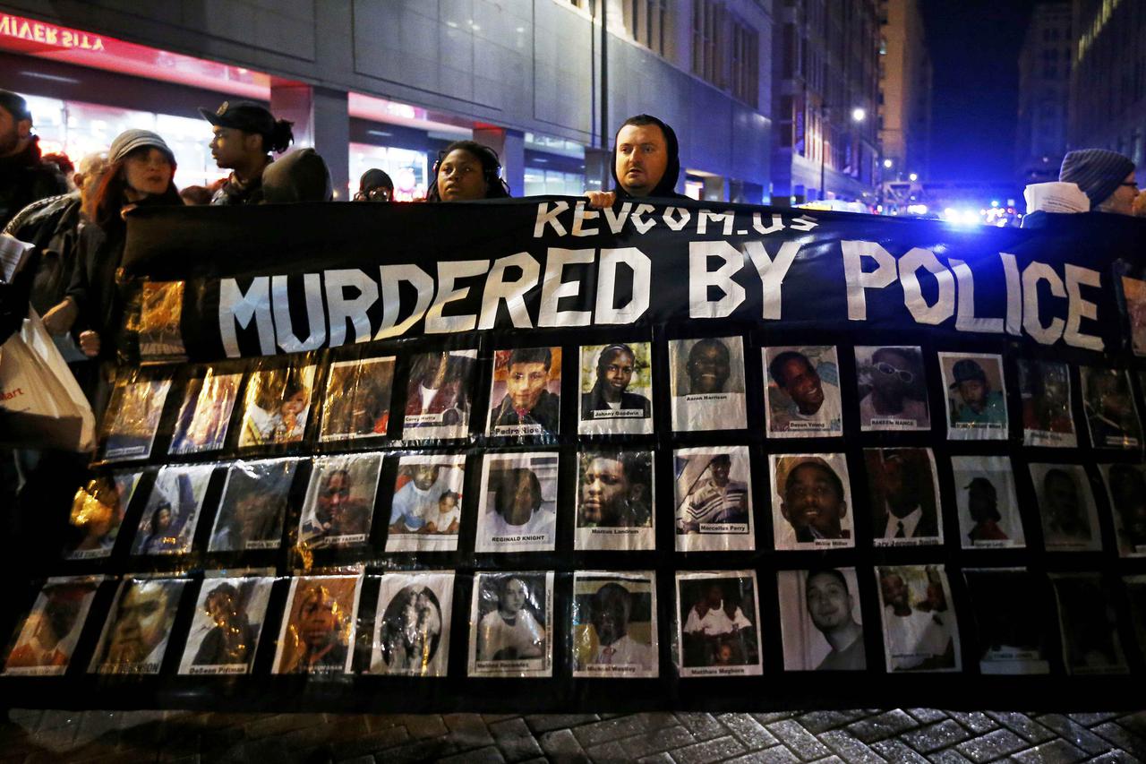 during protests in Chicago, Illinois November 24, 2015 reacting to the release of a police video of the 2014 shooting of a black teenager, Laquan McDonald, by a white policeman, Jason Van Dyke. Van Dyke was charged with murder in the incident. REUTERS/Jim