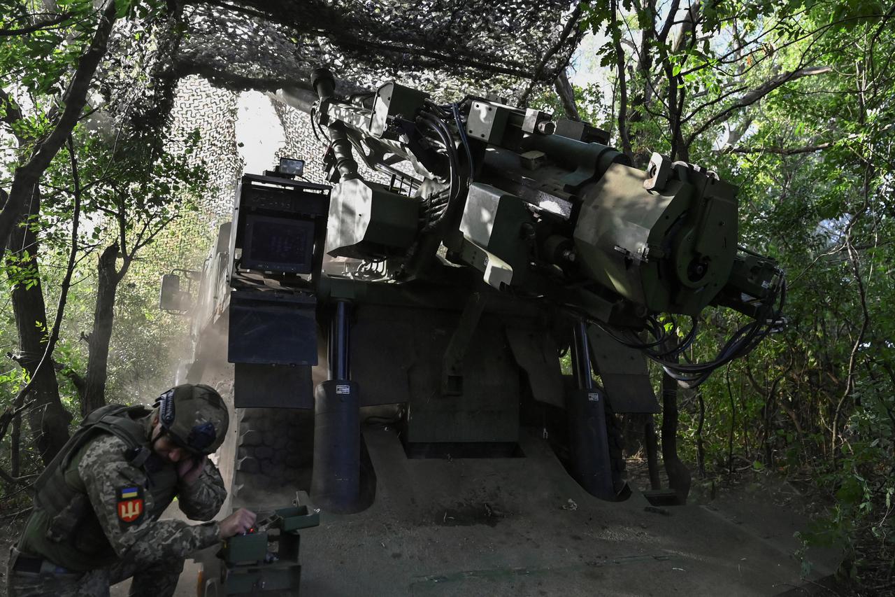 Ukraine serviceman fires a Caesar self-propelled howitzer towards Russian troops, outside the town of Pokrovsk