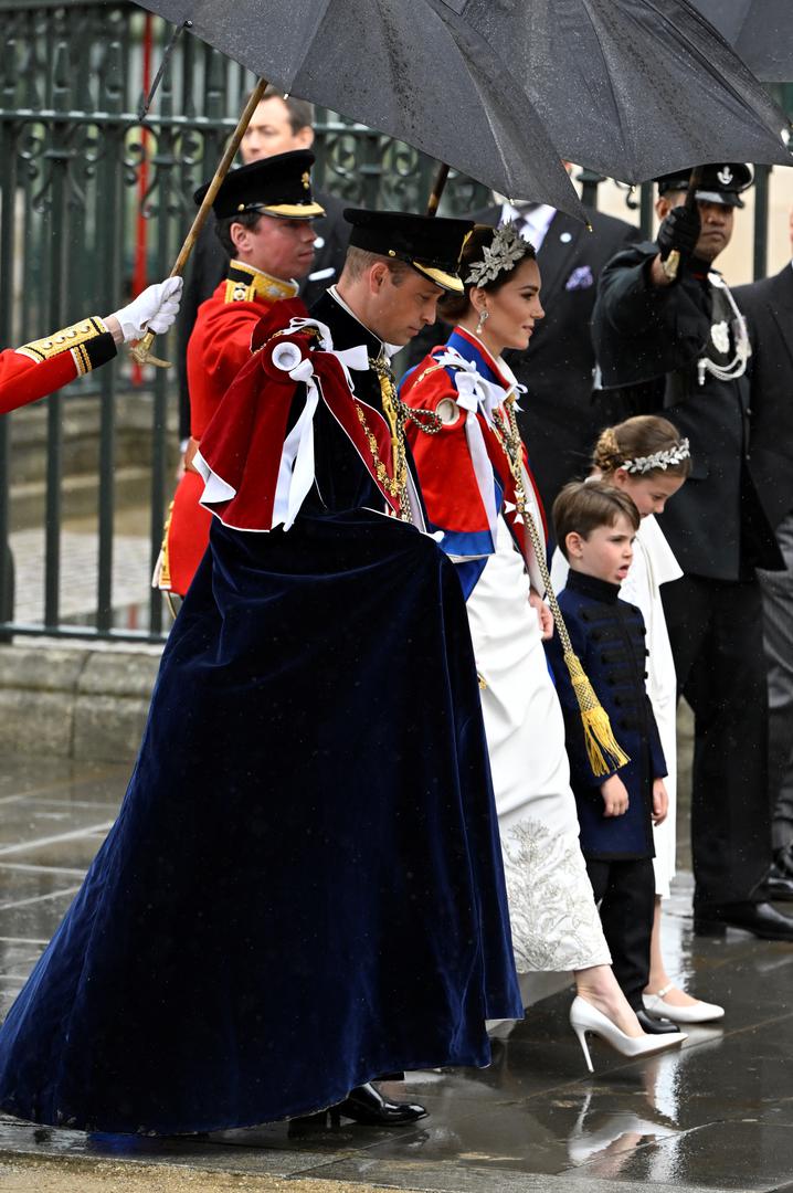 Britain's Prince William, Catherine, Princess of Wales, and their children Princess Charlotte and Prince Louis arrive at Westminster Abbey to attend Britain's King Charles and Queen Camilla coronation ceremony, in London, Britain May 6, 2023. REUTERS/Toby Melville/Pool Photo: Toby Melville/REUTERS