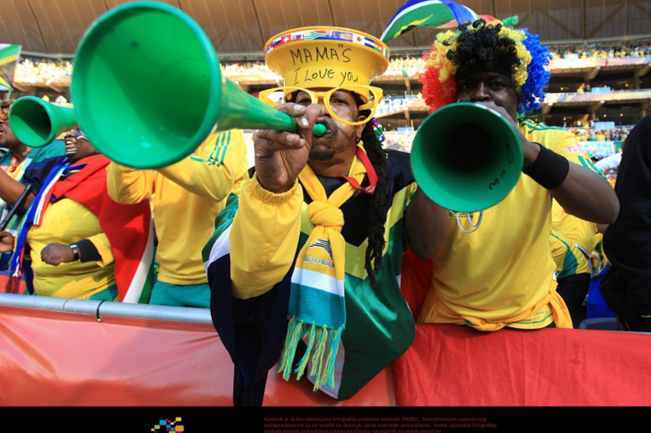 'South Africa fans blow Vuvuzelas inside the Soccer City Stadium prior to kick off Photo: Press Association/Pixsell'