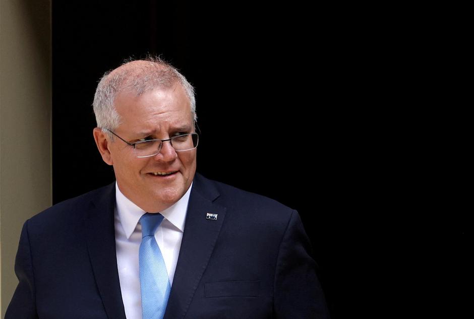 FILE PHOTO: FILE PHOTO: British PM Johnson meets Australian counterpart Morrison in London