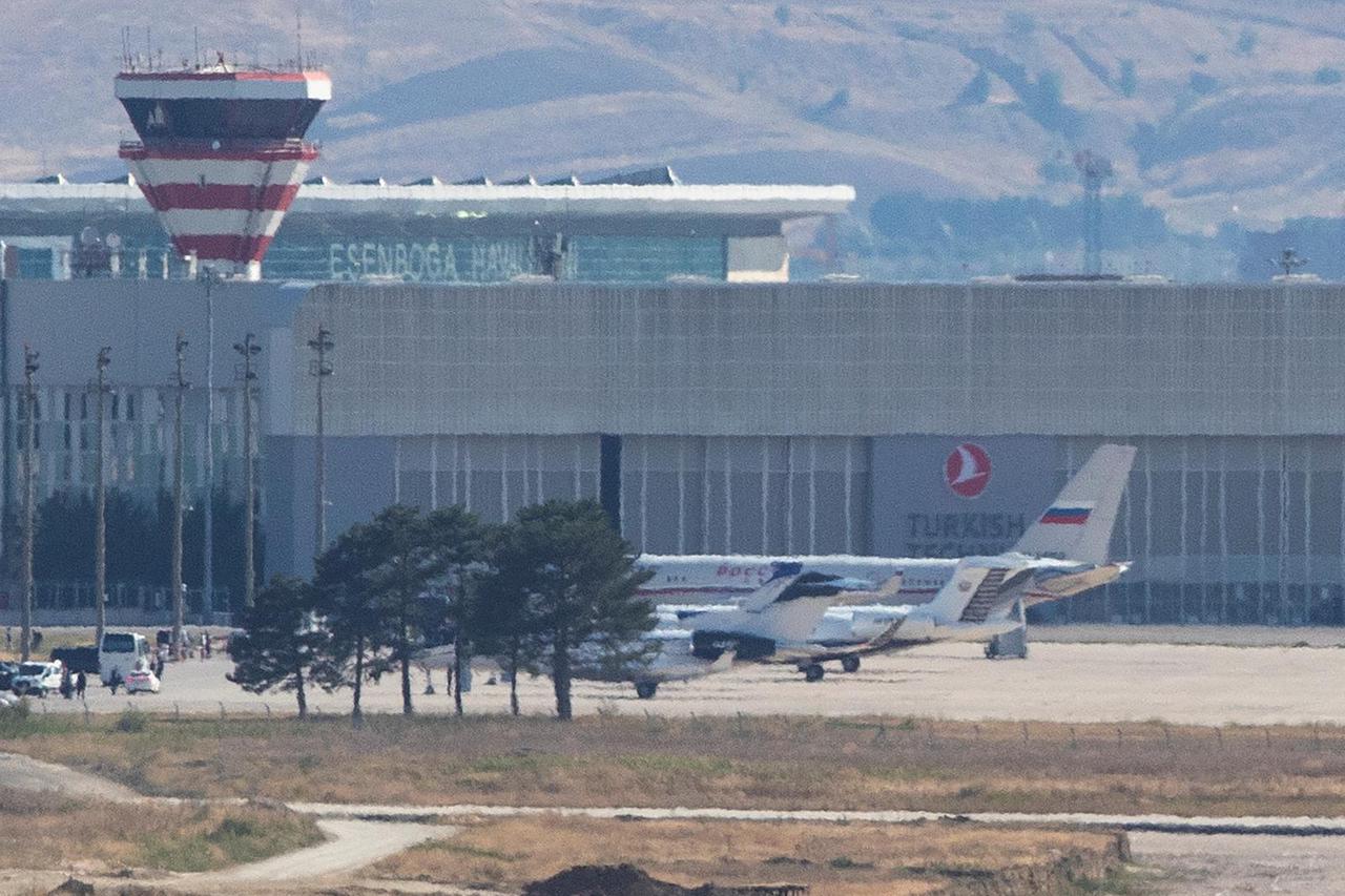 A Russian government plane is seen on the tarmac after landing at Esenboga Airport in Ankara