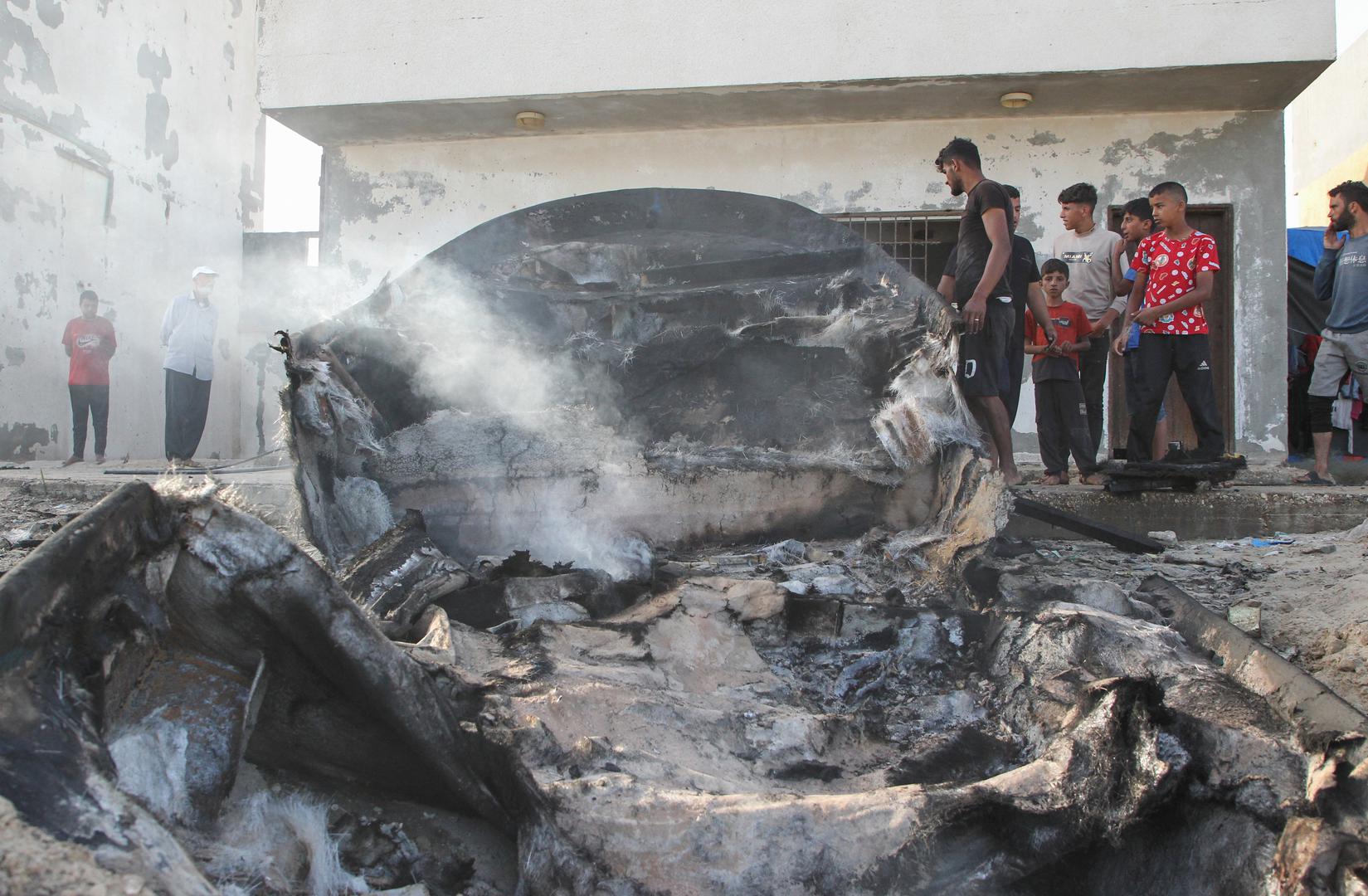 Palestinians inspect boats damaged in Israeli fire, amid the ongoing conflict between Israel and Palestinian Islamist group Hamas, in Rafah in the southern Gaza Strip May 22, 2024. REUTERS/Hatem Khaled Photo: HATEM KHALED/REUTERS