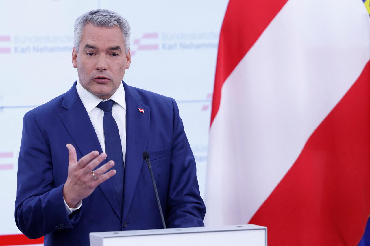 Austrian Chancellor and head of Peoples Party Karl Nehammer addresses the media in Vienna