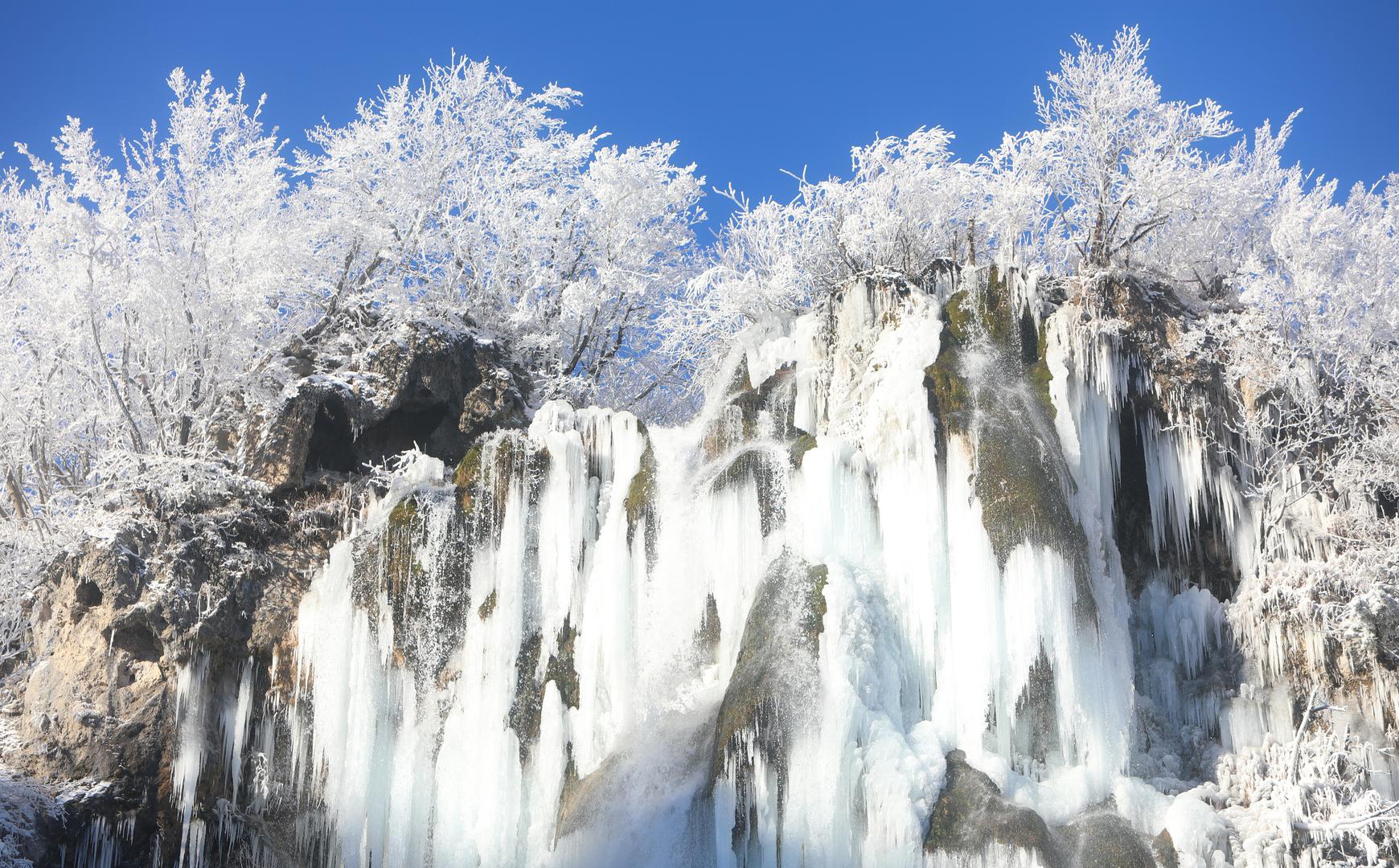 13.01.2024., Plitvicka jezera - Snijeg i debeli minusi zaledili su slapove na Plitvickim jezerima koji mame uzdahe brojnih posjetitelja. Photo: Kristina Stedul Fabac/PIXSELL