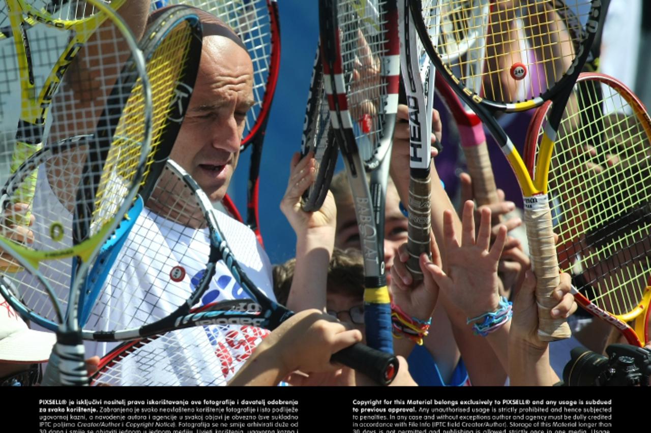 '26.07.2011., Stella Maris, Umag - 22. Studena Croatia Open Umag, s djecom se na Ina kids week powered by Babolat druzio Ivan Ljubicic. Photo: Sanjin Strukic/PIXSELL'