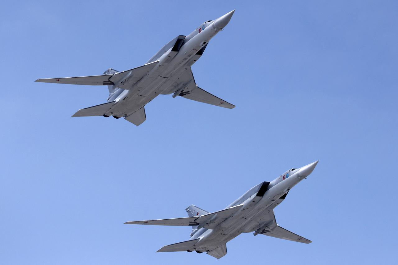 FILE PHOTO: Russian Tu-22M3 bombers fly in formation in rehearsal for Victory Day Parade in Moscow