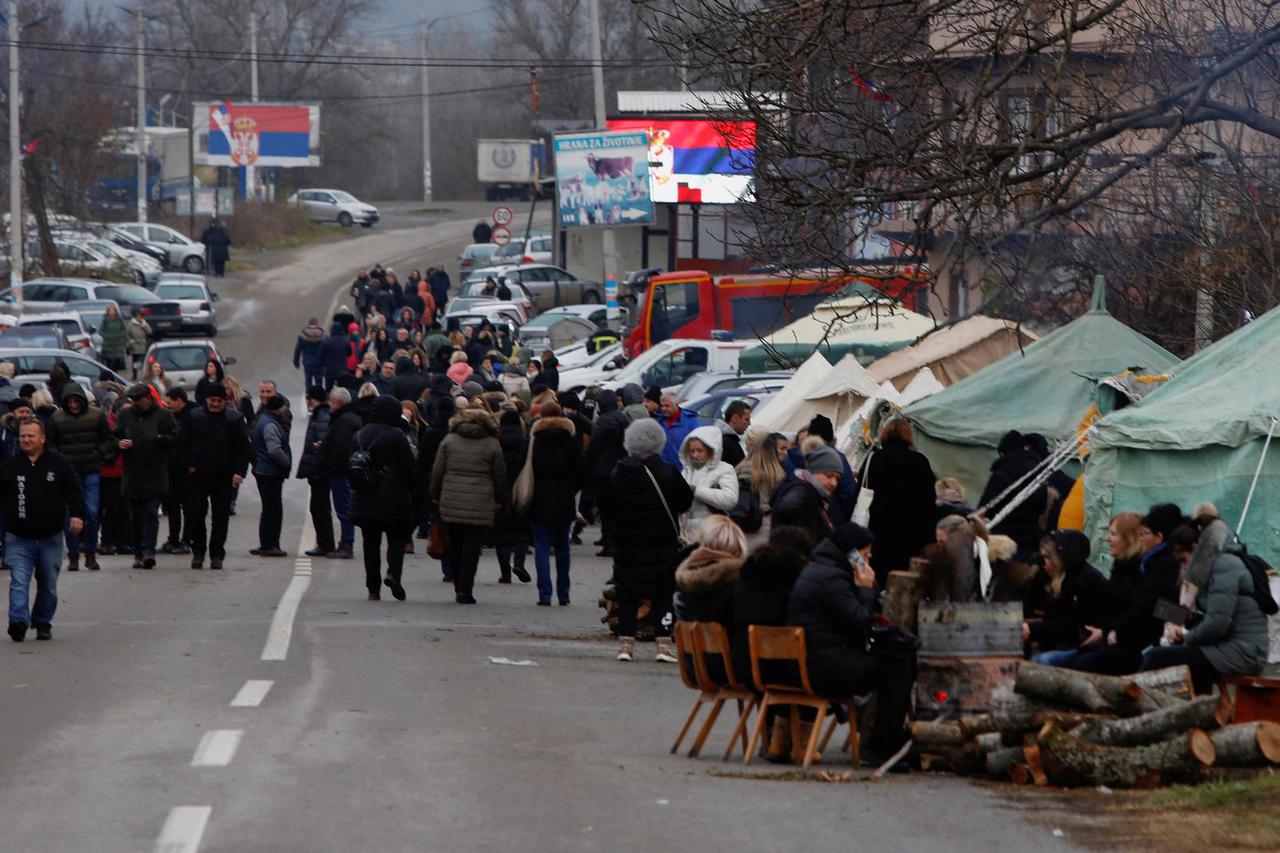 Kosovo Serbs block the road near the village of Rudine