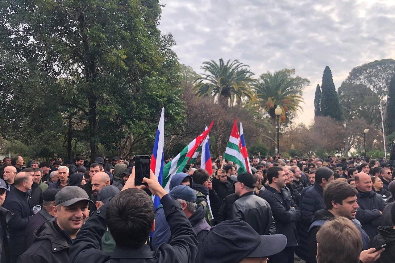 Protesters rally outside the parliament building in the capital of Georgia's breakaway region of Abkhazia