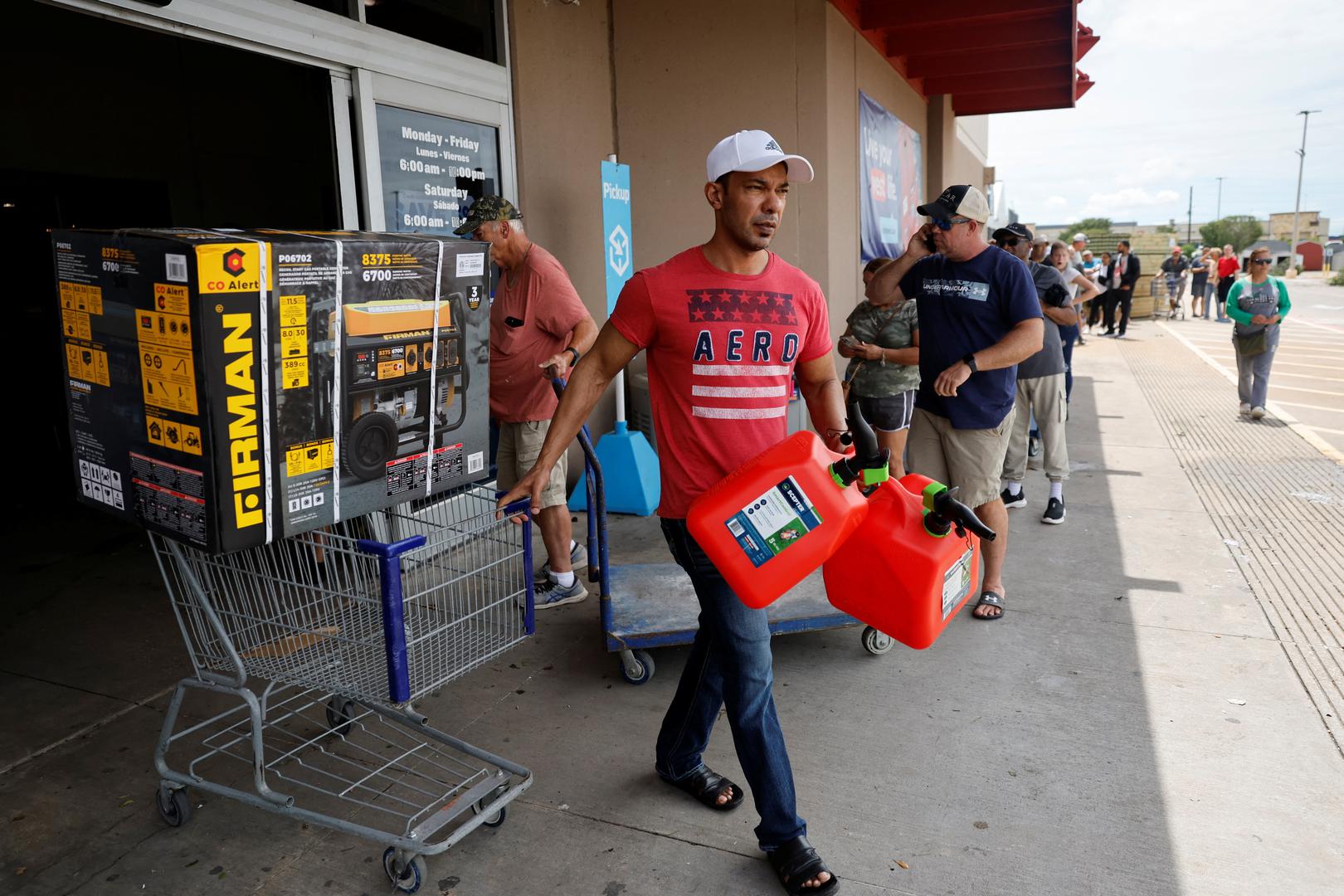 A person exits a store in the aftermath of Hurricane Beryl, in Rosenberg, Texas, U.S., July 8, 2024. REUTERS/Daniel Becerril Photo: DANIEL BECERRIL/REUTERS