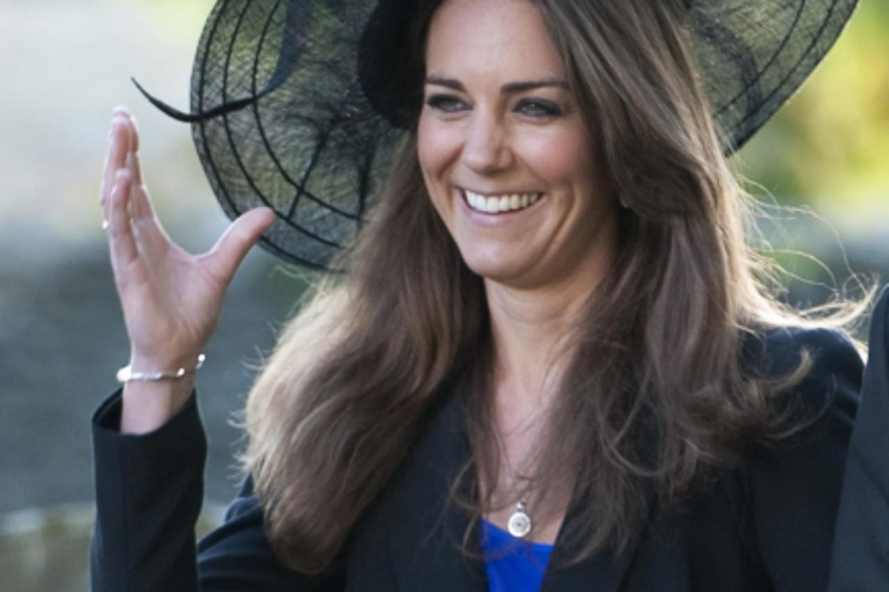 'Prince William and Kate Middleton attend the wedding of their friends Harry Mead and Rosie Bradford in the village of Northleach, Gloucestershire. Photo: Press Association/Pixsell'