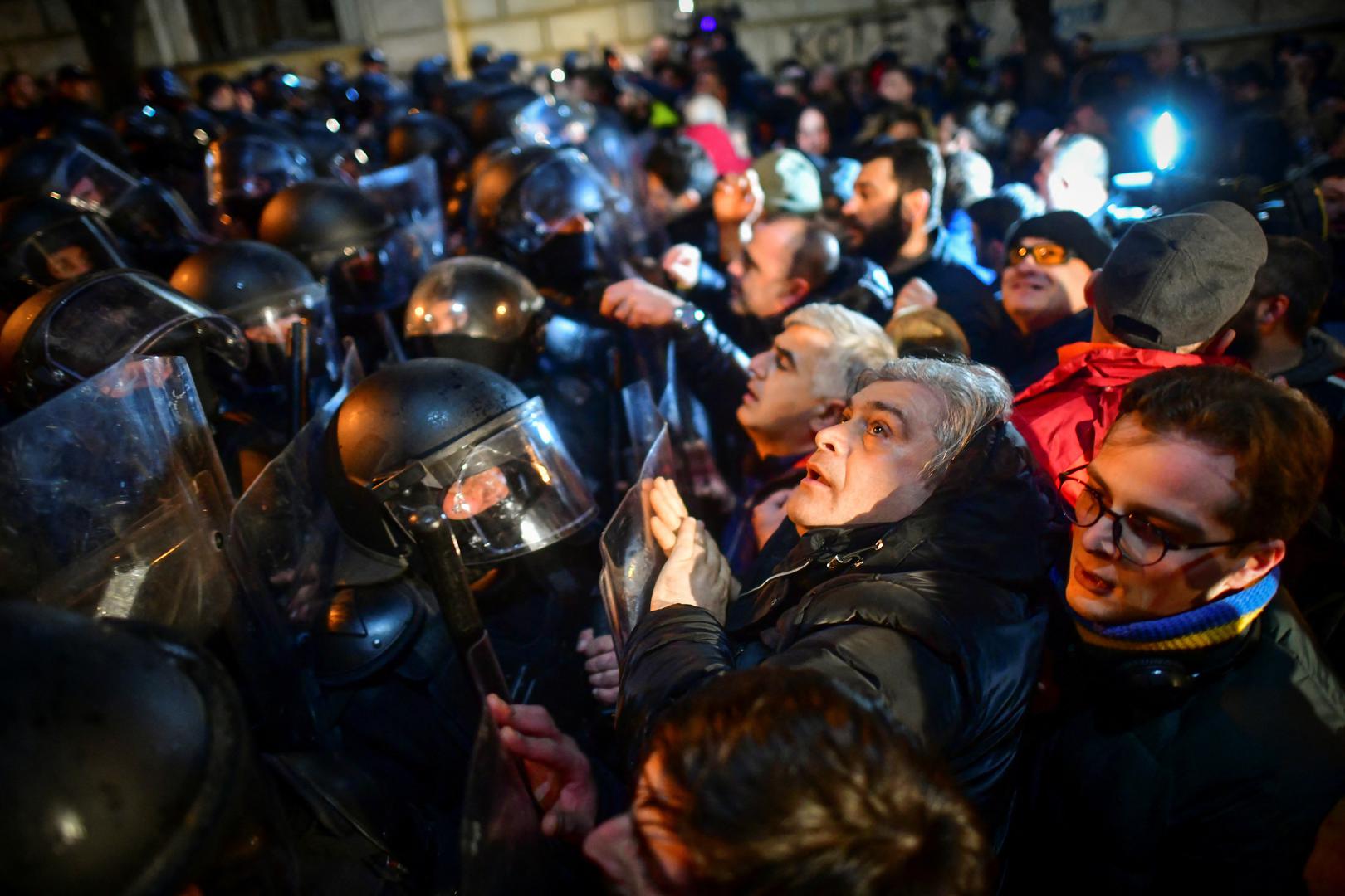 Protesters gather in front of police officers, who block the way during a rally against the "foreign agents" law in Tbilisi, Georgia, March 7, 2023. REUTERS/Zurab Javakhadze Photo: ZURAB JAVAKHADZE/REUTERS