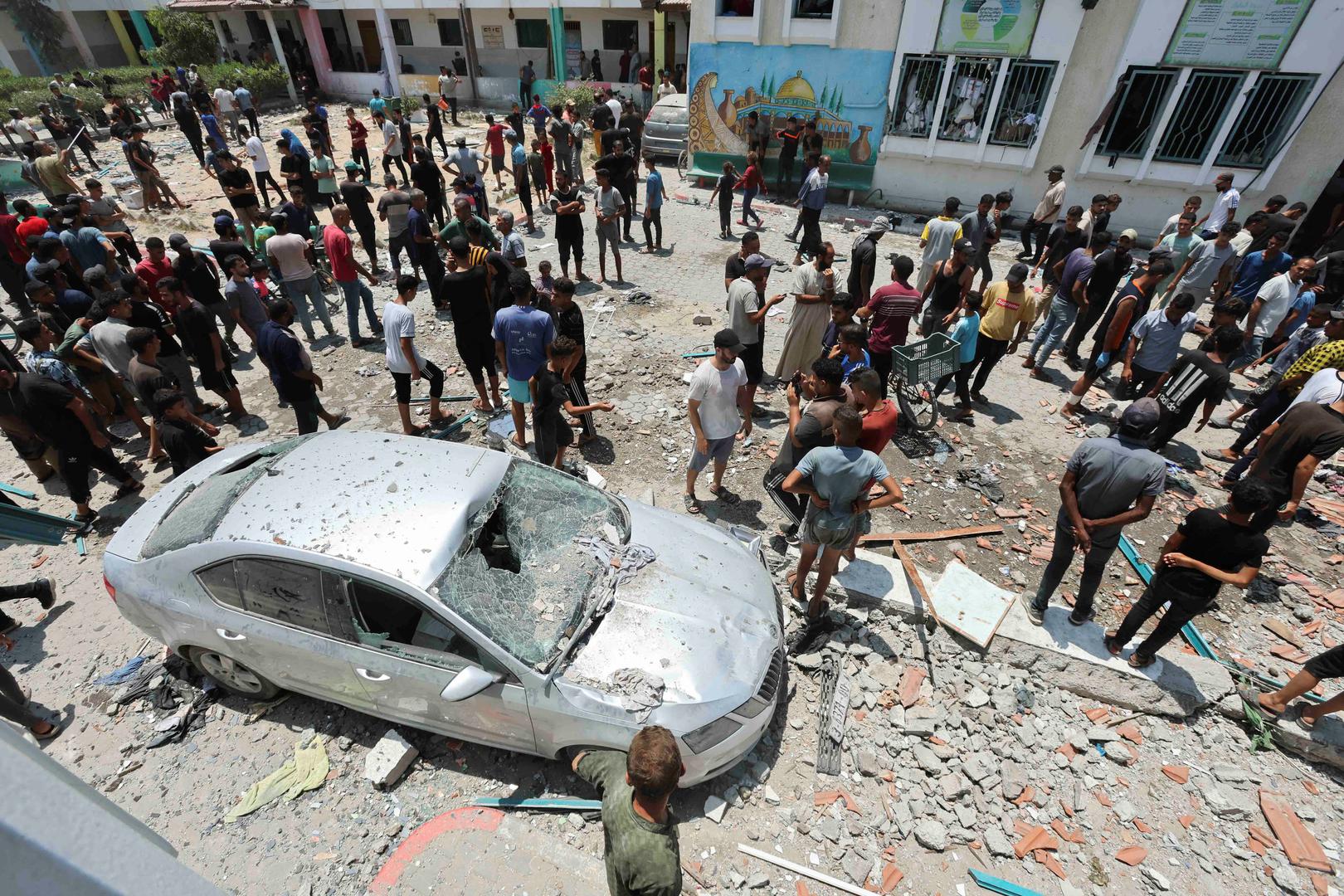 Palestinians inspect a school sheltering displaced people following an Israeli strike, amid Israel-Hamas conflict, in Deir Al-Balah in the central Gaza Strip, July 27, 2024. REUTERS/Ramadan Abed Photo: Ramadan Abed/REUTERS