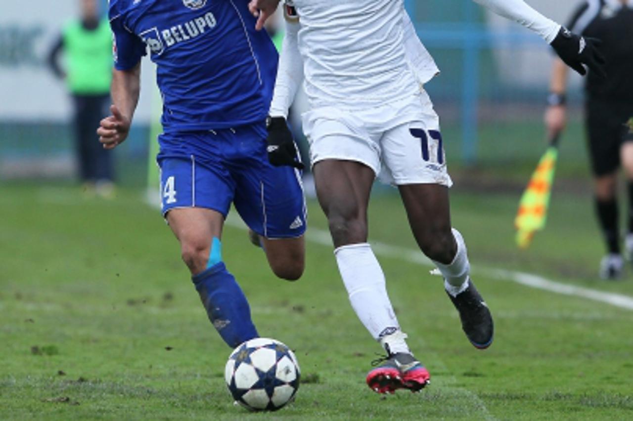 '10.04.2013., Koprivnica - Prva polufinalna utakmica Hrvatskog nogometnog kupa, NK Slaven Belupo - HNK Hajduk. Kouassi Jean Evrard, Mateas Delic. Photo: Marijan Susenj/PIXSELL'