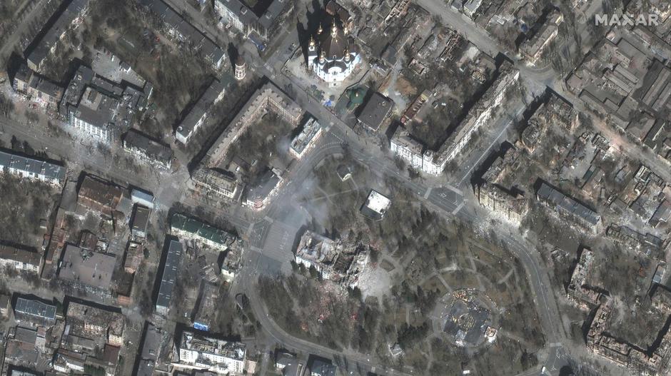 A satellite image shows extensive damage to Mariupol theater and nearby buildings, in Mariupol