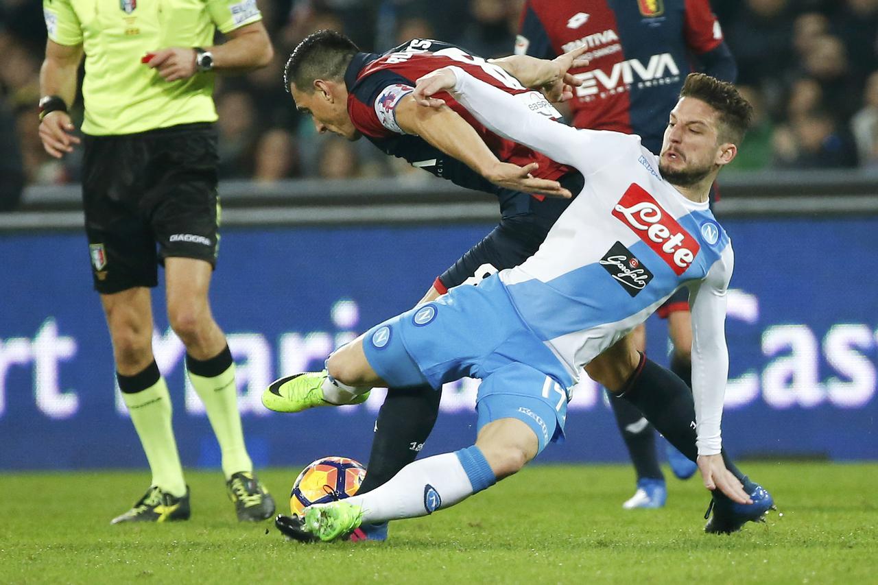 Football Soccer - Napoli v Genoa - Italian Serie A Football Soccer - Napoli v Genoa - Italian Serie A - San Paolo stadium, Naples, Italy - 10/02/17 - Napoli's Dries Mertens in action against Genoa's Nicolas Burdisso.  REUTERS/Ciro De Luca CIRO DE LUCA