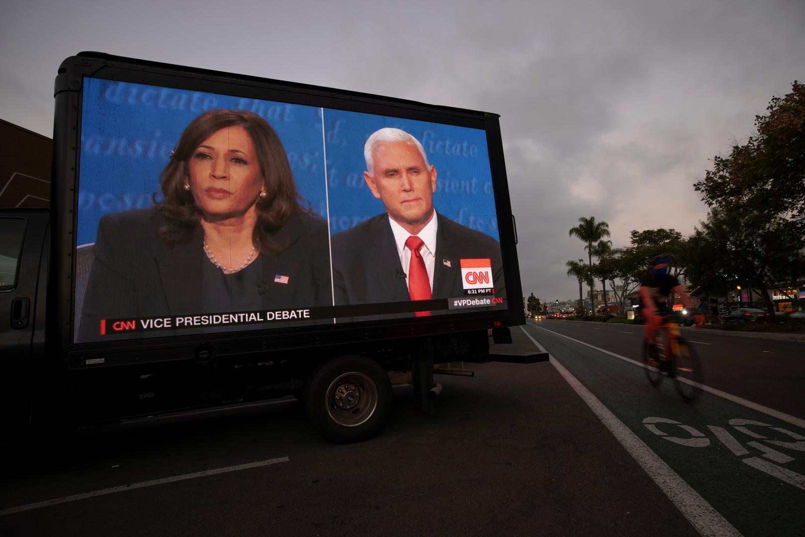 A digital truck broadcasts the debate between U.S. Vice President Mike Pence and Democratic vice-presidential nominee Kamala Harris outside a tavern in San Diego A digital truck broadcasts the debate between U.S. Vice President Mike Pence and Democratic vice-presidential nominee Kamala Harris outside a tavern in San Diego, California, U.S., October, 7, 2020. REUTERS/ Mike Blake MIKE BLAKE