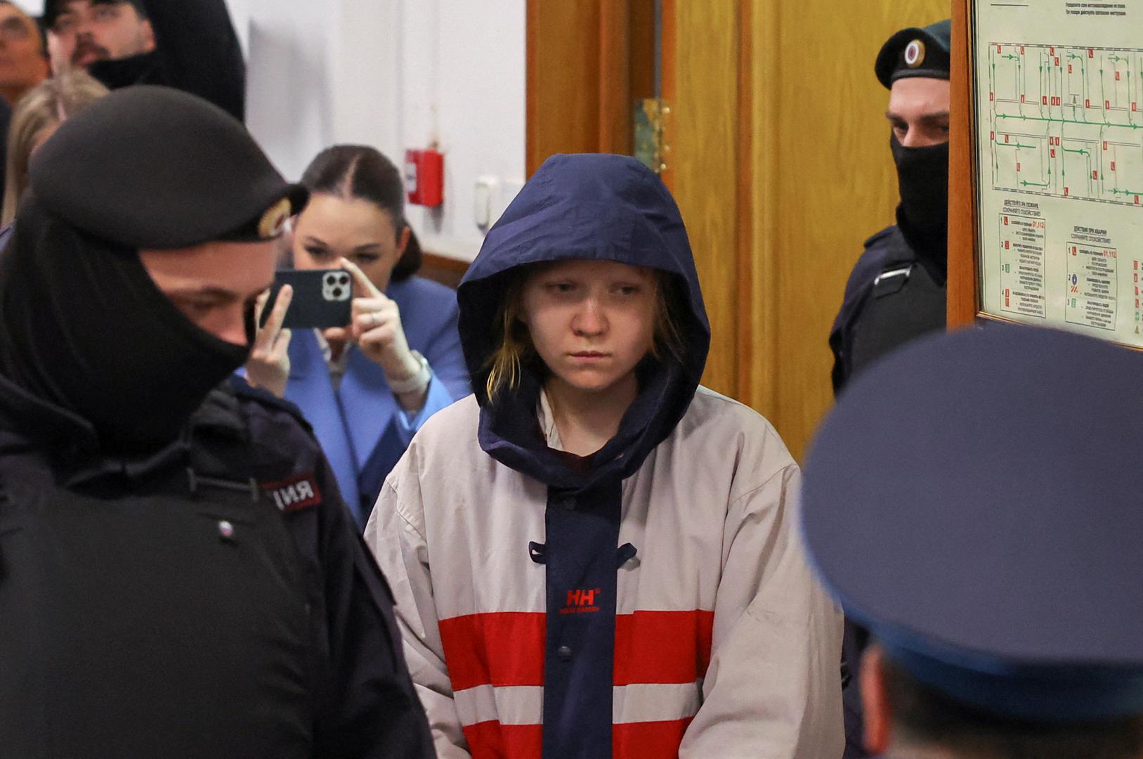 Darya Trepova, who is suspected of the killing of Russian military blogger Maxim Fomin widely known by the name of Vladlen Tatarsky, is escorted inside a court building before a hearing in Moscow, Russia, April 4, 2023. REUTERS/Evgenia Novozhenina Photo: EVGENIA NOVOZHENINA/REUTERS