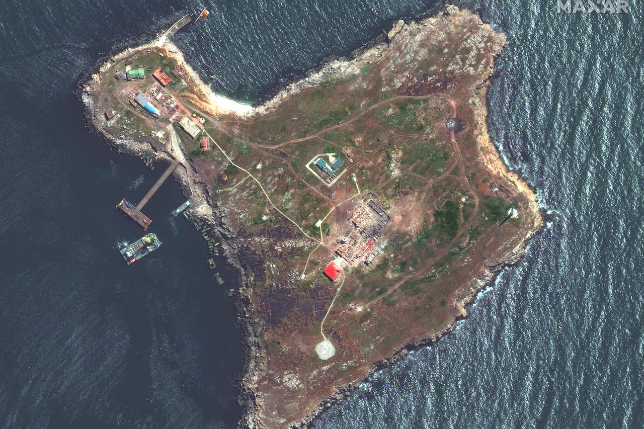 A satellite image shows an overview of Snake Island