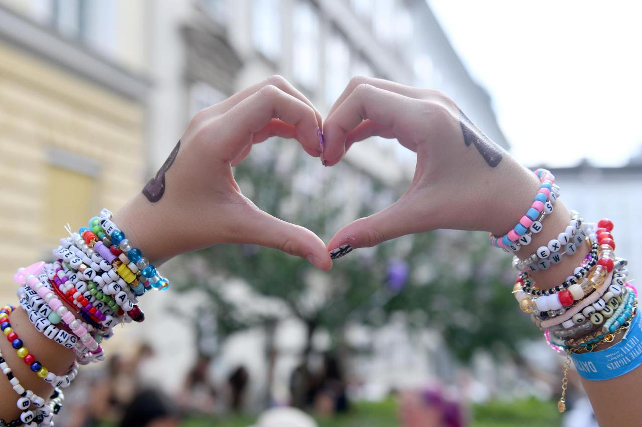 Fans gather after the government confirmed a planned attack at the venue of three Taylor Swift concerts, in Vienna