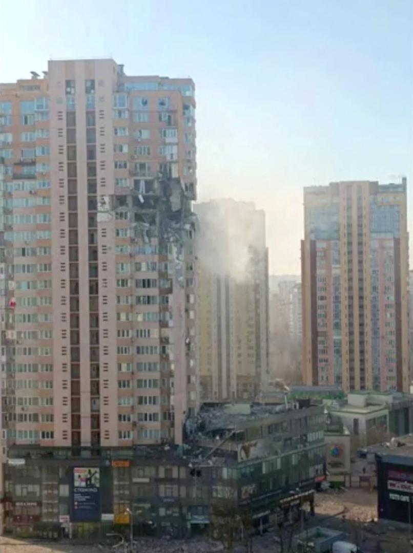 A screengrab from a video shows a damaged multi-storey residential building in an aftermath of shelling, after Russia launched a massive military operation against Ukraine, in south-west of Kyiv, Ukraine February 26, 2022. State Emergency Services of Ukraine/Reuters TV via REUTERS  ATTENTION EDITORS - THIS IMAGE WAS PROVIDED BY A THIRD PARTY.