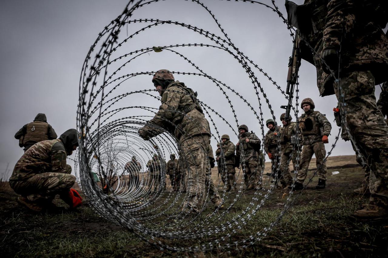 Ukrainian servicemen attend military exercises at a training ground in Donetsk region